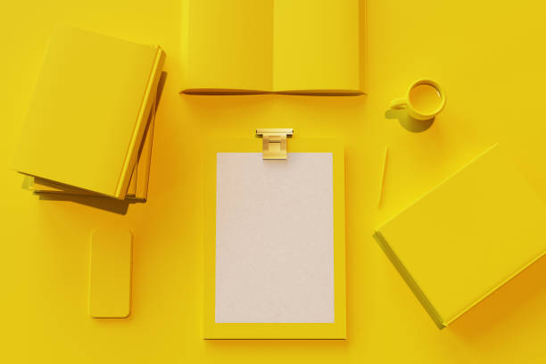 blank sheet in clipboard with monochrome desk objects