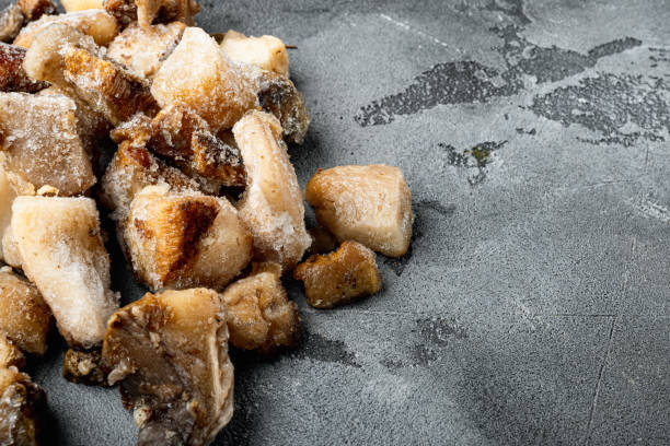 istock Frozen wild mushrooms, on gray stone background, with copy space for text 1326343876
