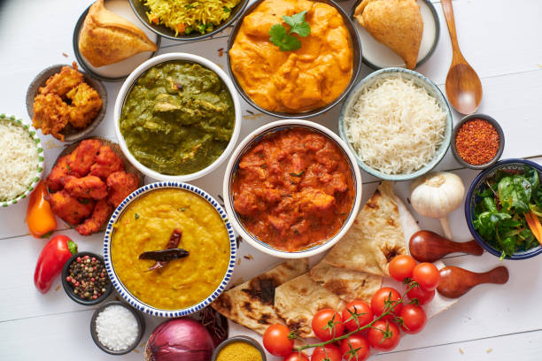 istock Assorted Indian various food with spices, rice and fresh vegetables 1326348295