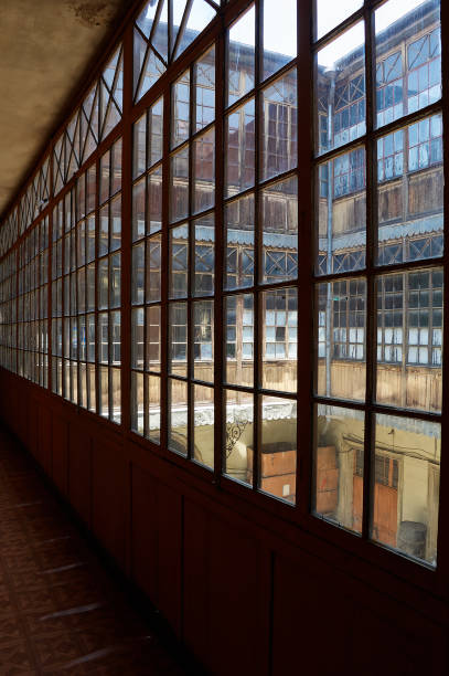 istock Detail of corridor and windows inside old inn. 1326352250