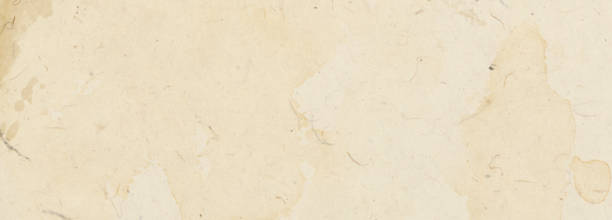 istock Vintage banner background with old beige paper texture with spots 1326353235