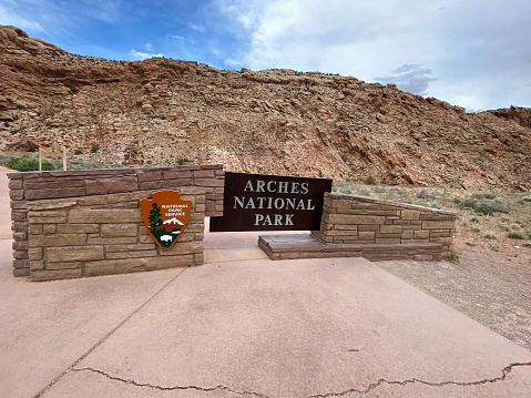 Moab, Utah - May 10, 2021: Sign at entrance to Arches National Park in Moab, Utah.