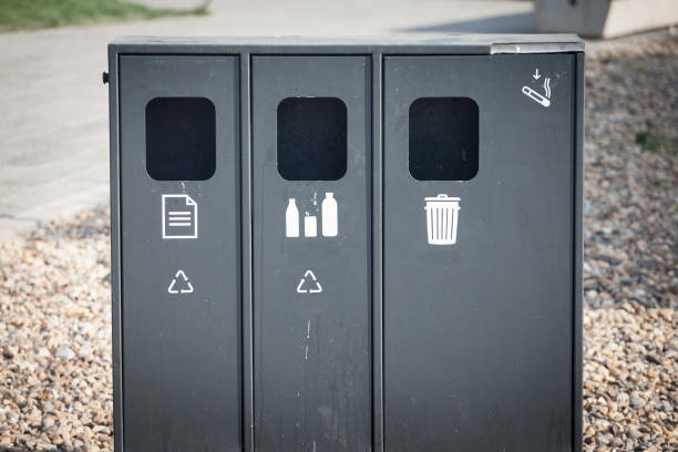 istock Selective blur on a recycling trash can where you can separate your metal, glass, and plastic garbage. Such a recycling waste container is used to encourage people to recycle. 1326355730