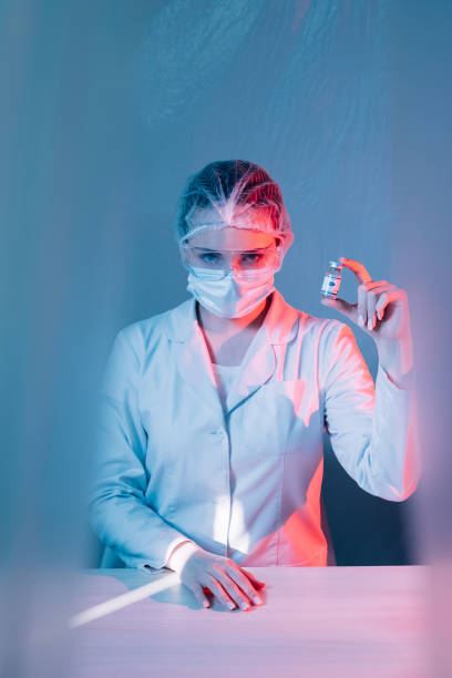 istock vaccine development covid-19 cure doctor vial dose 1326356945