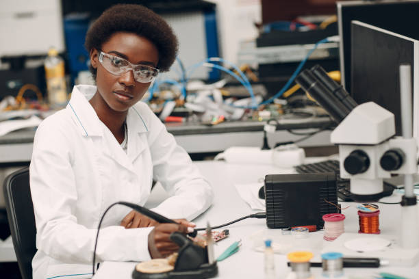 istock Scientist african american woman working in laboratory with electronic instruments 1326356988