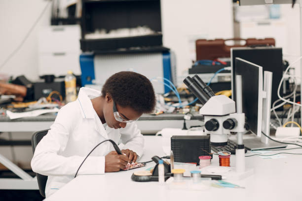 istock Scientist african american woman working in laboratory with electronic instruments 1326356989