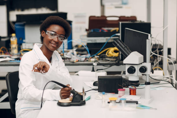 istock Scientist african american woman working in laboratory with electronic instruments 1326356992