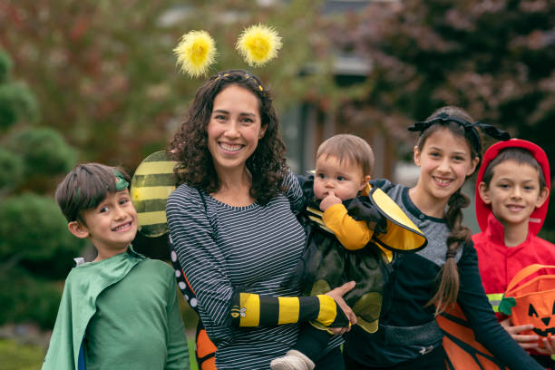 istock Mixed race family trick or treating 1326358502