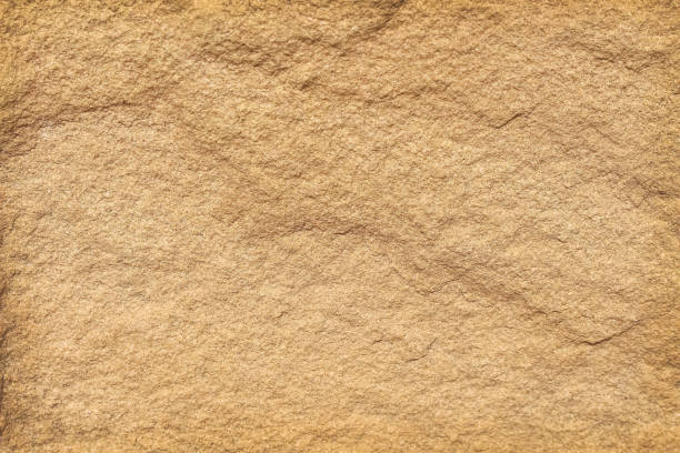 istock Close up sandstone natural brown background with space 1326365850