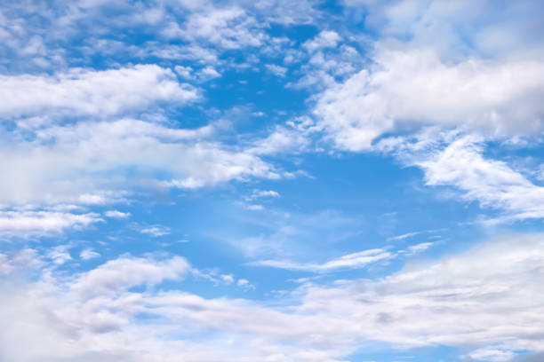 istock Soft texture of white clouds patterns on vast blue sky background with space and light wind 1326369446