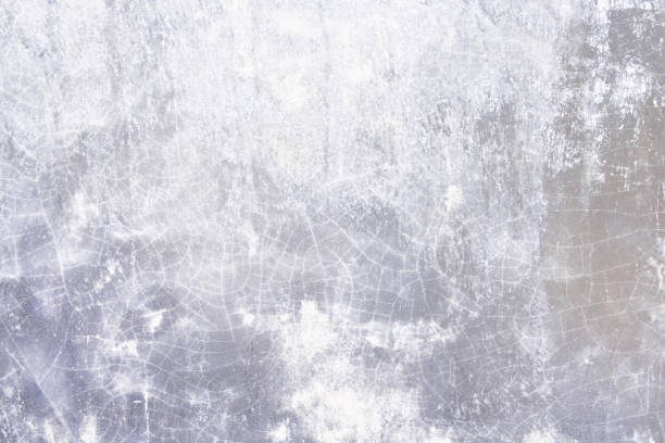 istock Grey white concrete wall with line cracked seamless patterns  old background 1326374031