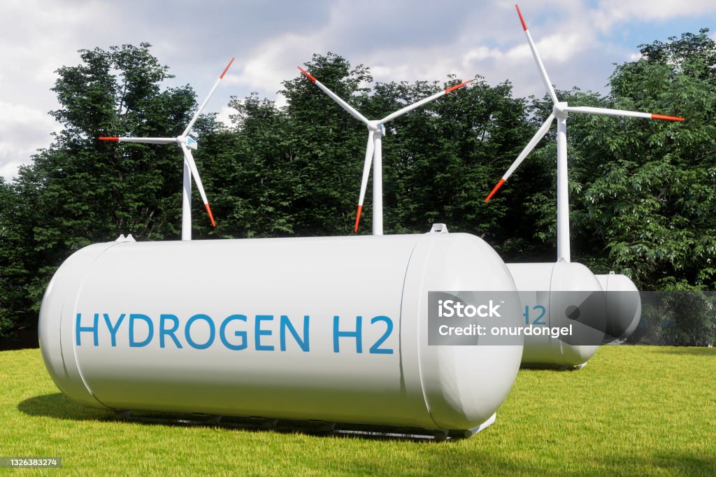 Hydrogen Storage Tanks In Renewable Energy And Wind Turbines In The Forest. Hydrogen Stock Photo
