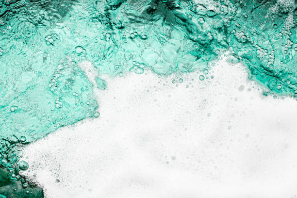 istock Blue sea water white foam texture background closeup, foamy ocean wave pattern, aqua bubbles surface, swimming pool backdrop, abstract summer sunny beach wallpaper, decorative frame border, copy space 1326386029