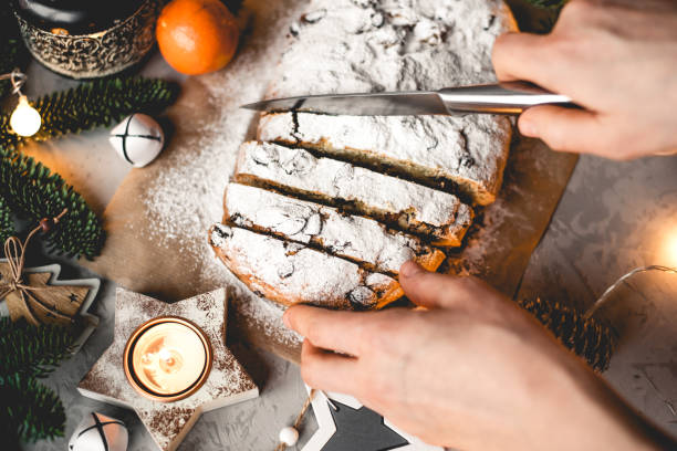 istock Traditional german stollen cake with Christmas decorations. 1326386616