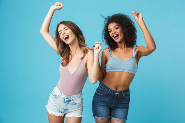 istock Two young girls dressed in summer clothes 1326389682