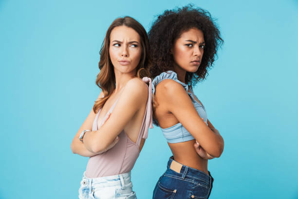 istock Two upset young girls dressed in summer clothes 1326389838