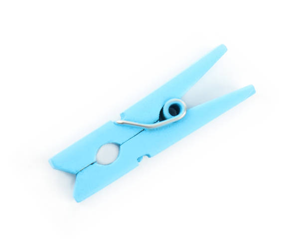istock Bright light blue wooden clothespin isolated on white 1326392527