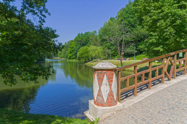 istock View from the footbridge to the pond. 1326396332