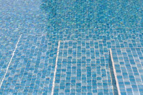 istock stairs in swimming pool with water 1326398320