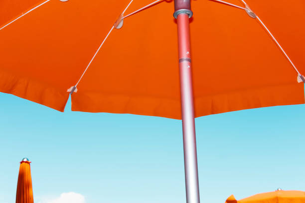 istock Colorful beach umbrella close up 1326399641