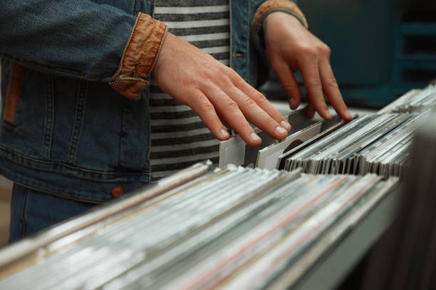 istock Man choosing vinyl records in store, closeup 1326399852
