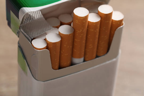 Cigarettes With Orange Filters In Pack Closeup Stock Photo - Download Australia