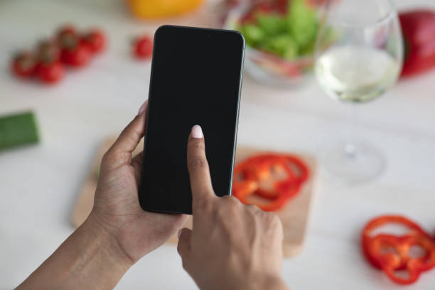 istock Social networks at home, mobile app and cooking with gadget 1326402211