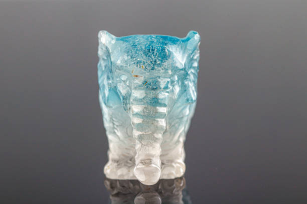 istock beautiful statuette elephant from the mineral topaz on a gray background 1326403352