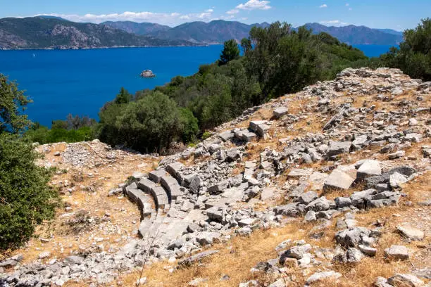 The most important structure of the ancient city of Amos, which was inhabited continuously from the Hellenistic period to the Eastern Roman period, is the theater. Turunc, Marmaris, Mugla.