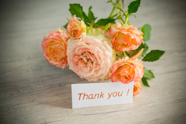 istock bouquet of beautiful orange roses on table 1326405506