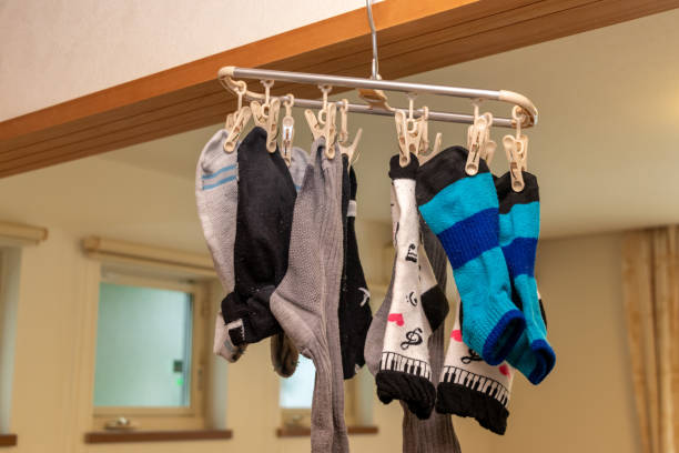 istock Many socks hanging in the room 1326409130
