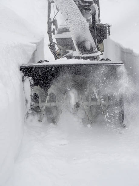 istock Clearing snow with a snowblower 1326410446