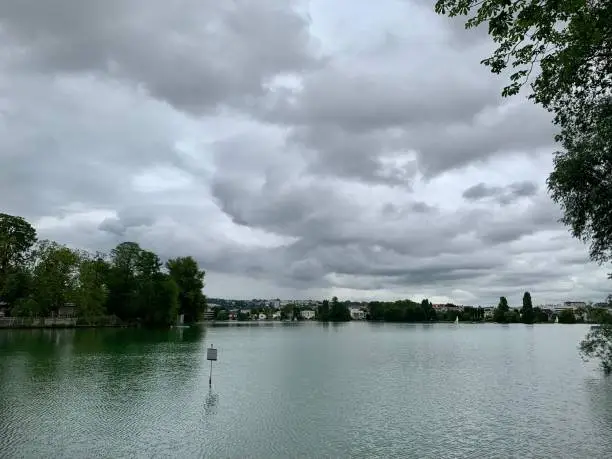 Photo of A moody sky over the lake.