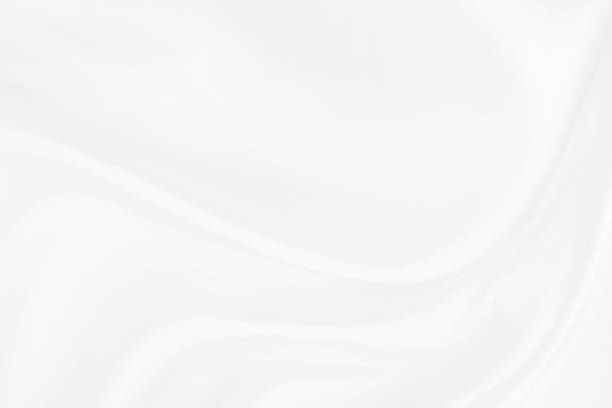 istock white cloth texture background with soft waves, crumpled fabric background 1326414848