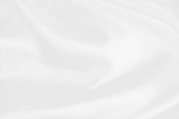 istock Abstract soft waves of white fabric background 1326415304