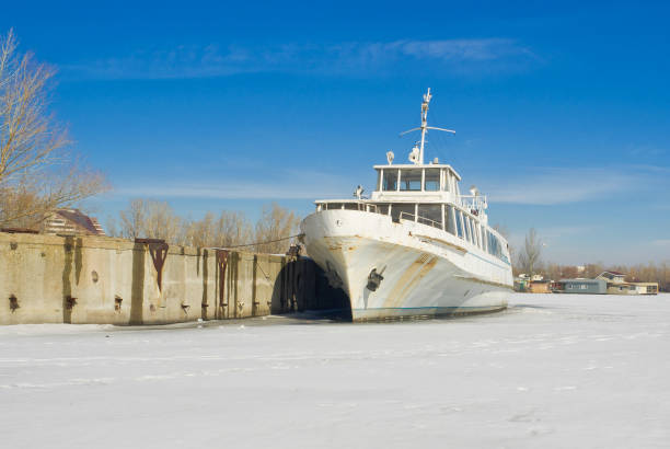 istock Retired pleasure boat on a winter berthing 1326419279
