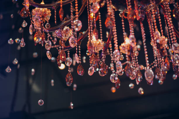 istock large crystal chandelier illuminated with multi-colored light in the restaurant 1326420672