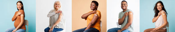 Diverse People Showing Vaccinated Arm After Antiviral Injection, Studio Wall