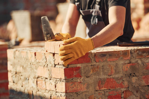 istock Construction worker in uniform and safety equipment have job on building 1326424421