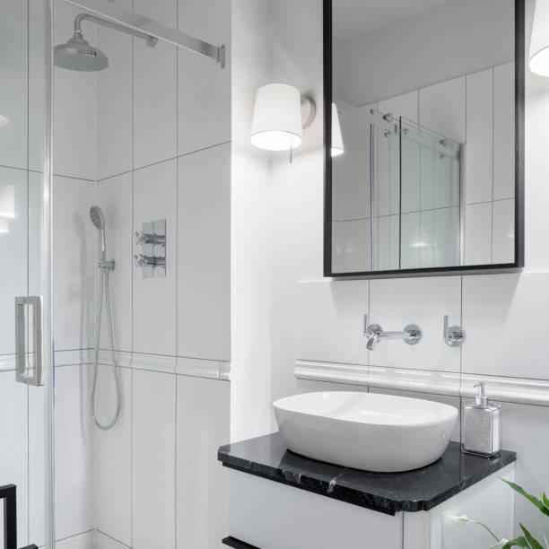 istock Small and elegant bathroom with shower 1326425049