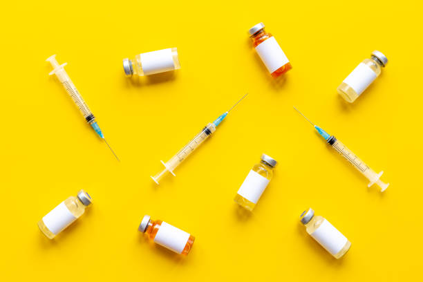istock Vaccine vial dose with with syringe. Vaccination concept 1326425909