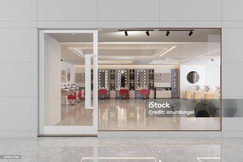 Exterior Of Hairdressing And Beauty Salon With Pink Chairs, Mirrors And Tiled Floor - Royaltyfri Affär Bildbanksbilder