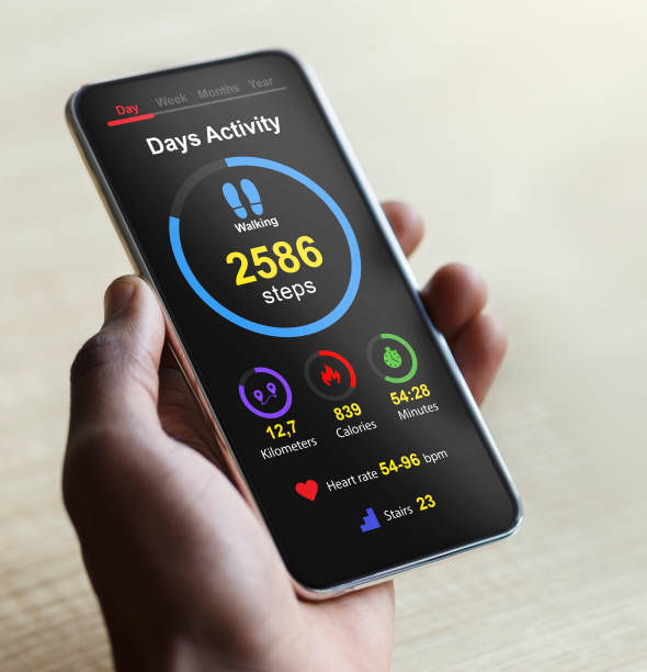 istock Male hand with smartphone, checking his daily activity 1326427744
