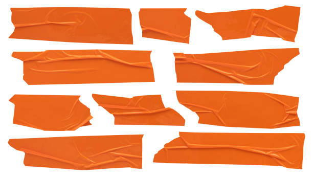 scotch naranja, juego de tiras pegajosas pegajosas de varias formas, papelería sobre fondo blanco - inmóvil fotos fotografías e imágenes de stock