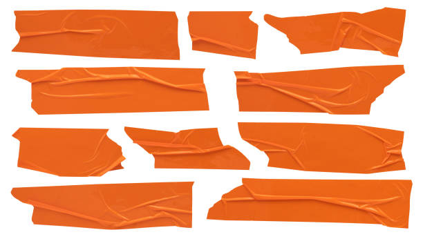 orange scotch, set of sticky glued strips of various shapes, stationery on white background - adhesive tape imagens e fotografias de stock