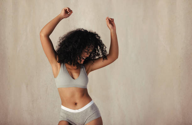 istock Female celebrating her natural beauty 1326434453