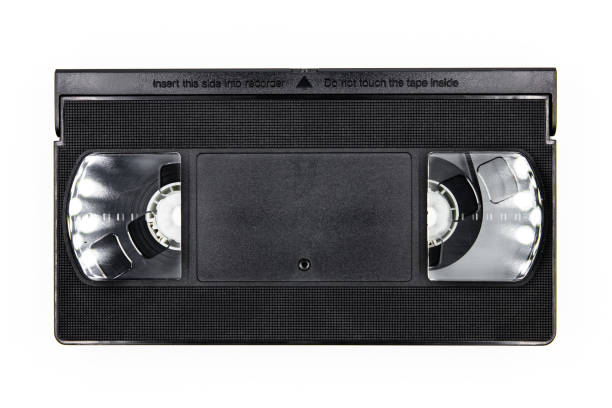 istock Front side of a old vhs videocassette, analog retro video tape isolated on white background, topview 1326437134
