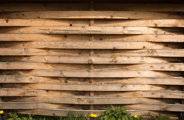 istock Decorative wooden fence from a slabs 1326437217