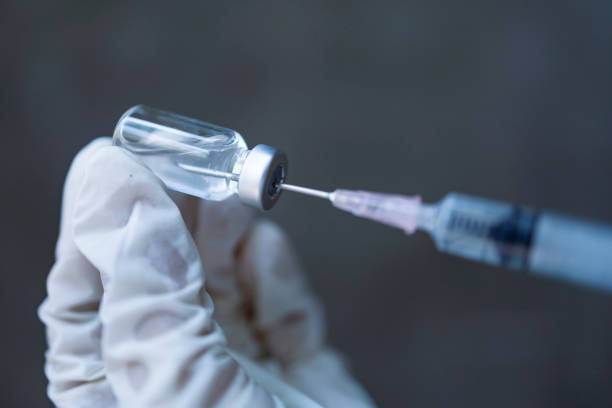 istock vaccine and syringe 1326438733
