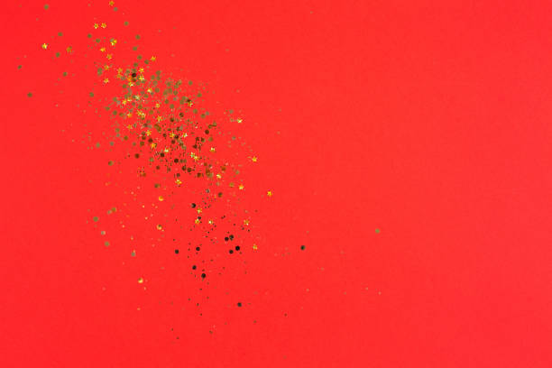 istock Christmas Gold glitter on red background. Holiday abstract texture 1326440195